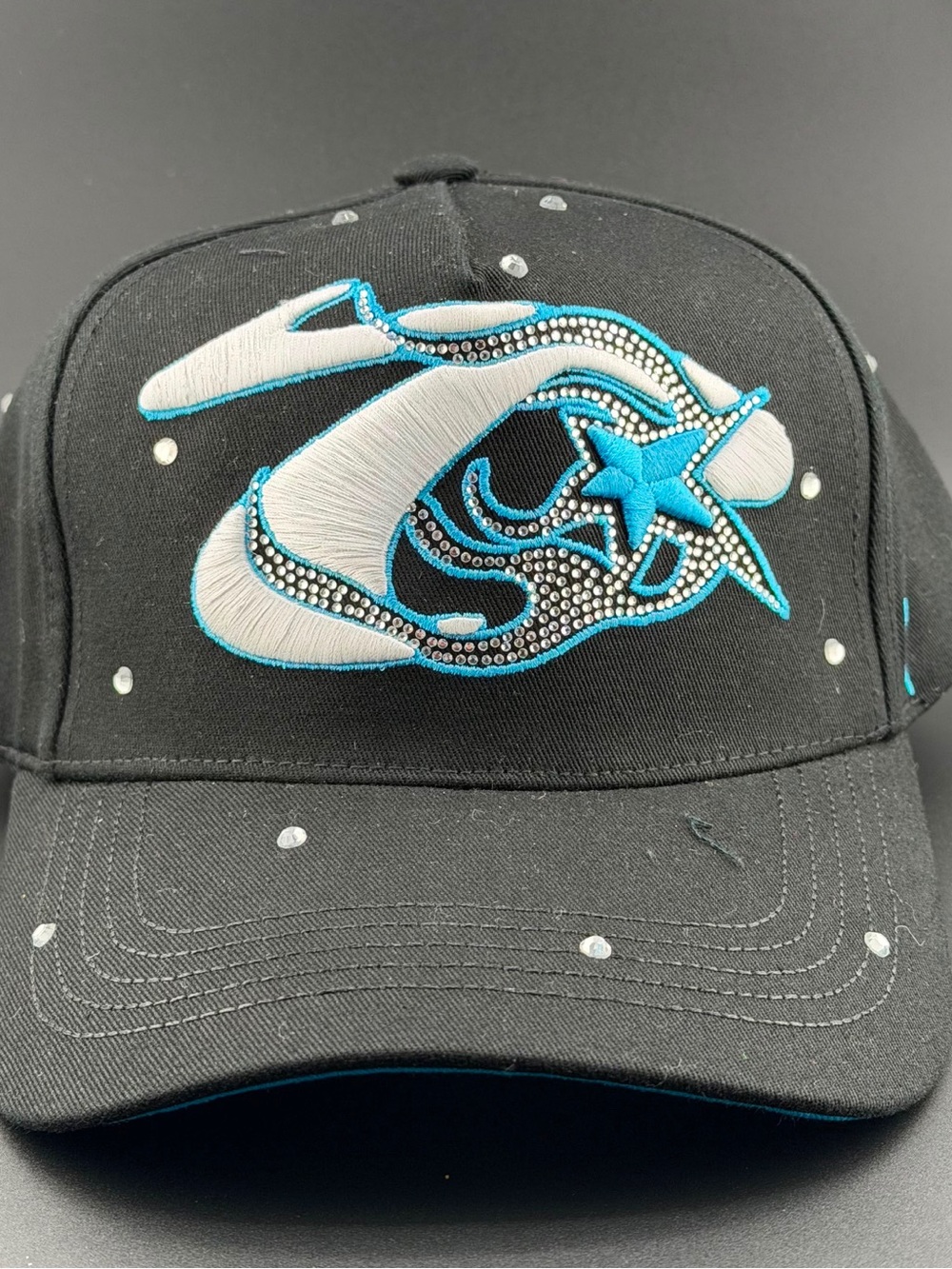 Black Baseball Cap with Blue & White Star Accent